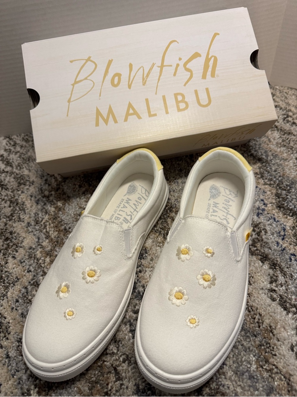 Blowfish Women’s White Slip-On Sneakers with Yellow Daisy Embroidery